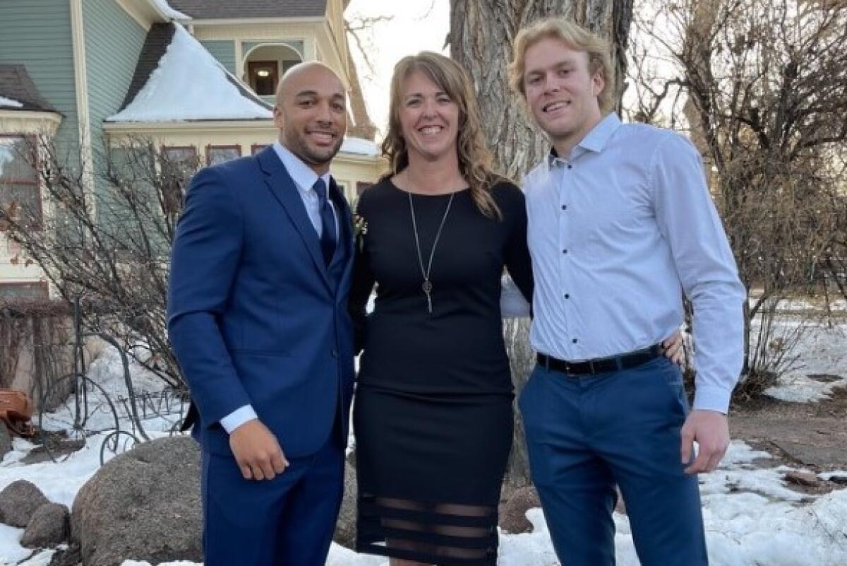 Austin, Suzanne and Wyett Ekeler outside their mom's home in Colorado.