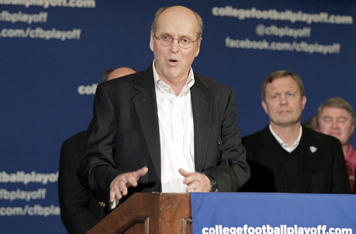 Bill Hancock heads the College Football Playoff.