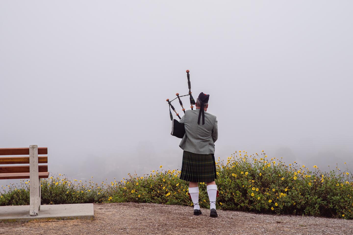 Ian Kelly plays music on his bagpipes at Mt. Soledad National Veterans Memorial.