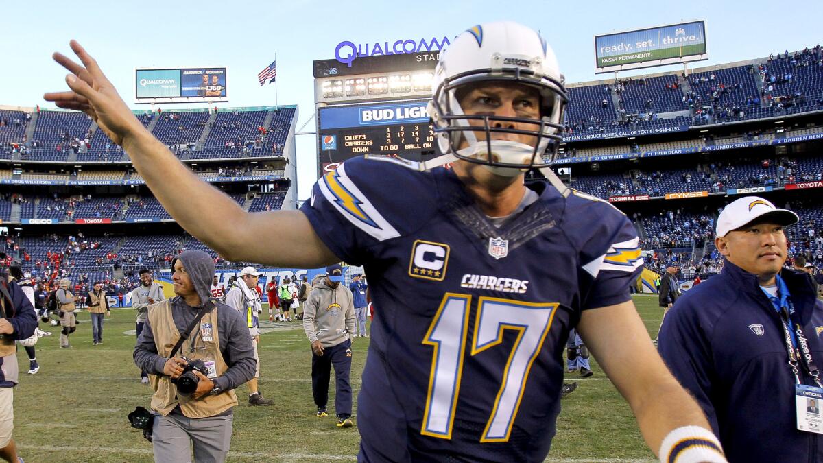 Chargers quarterback Philip Rivers waves as he leaves Qualcomm Stadium after the team's last game in San Diego on Jan. 1.