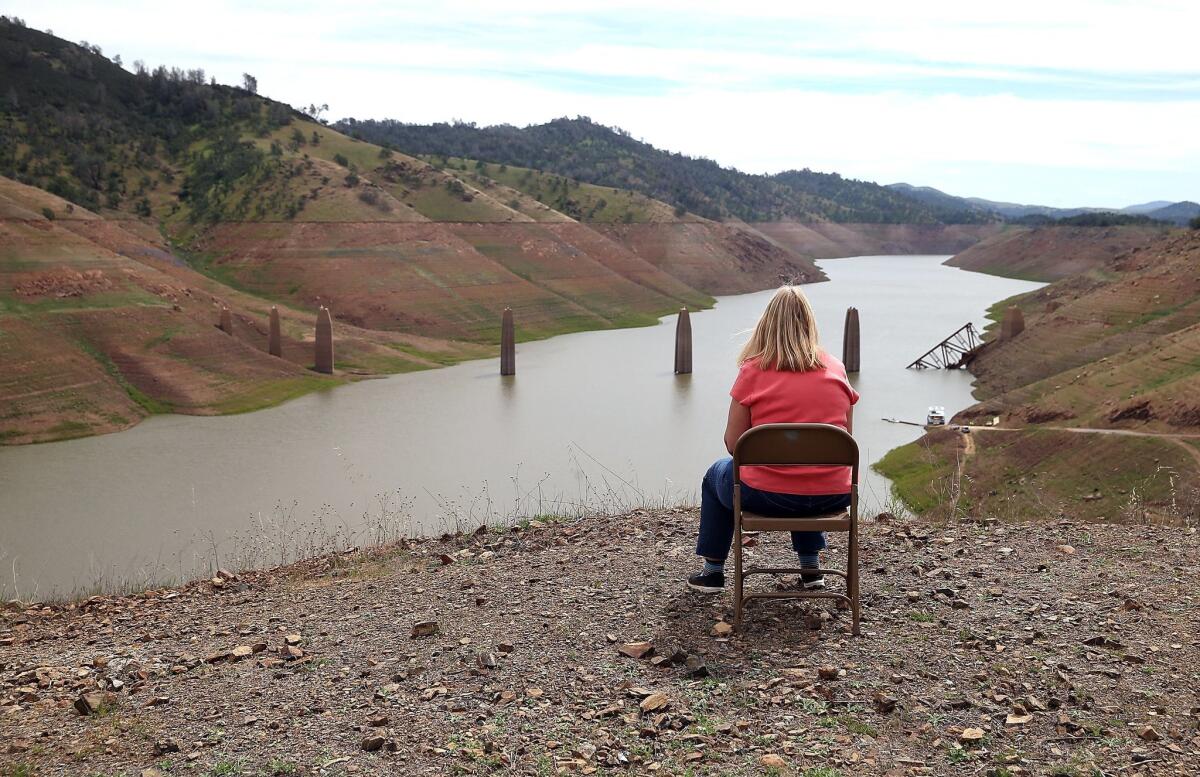 Low water levels at Lake McClure in La Grange threaten the water supply for more than 3,000 residents in the Sierra Nevada foothill community of Lake Don Pedro. Conservation advocates say the $1 billion drought relief package passed by lawmakers Thursday provides little immediate assistance.