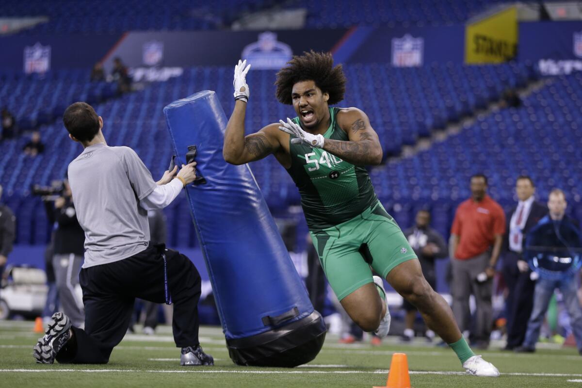 USC defensive lineman Leonard Williams runs a drill during the NFL scouting combine in Indianapolis on Feb. 22.