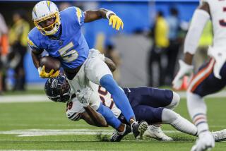 Chargers wide receiver Joshua Palmer (5) runs after a catch against the Bears.