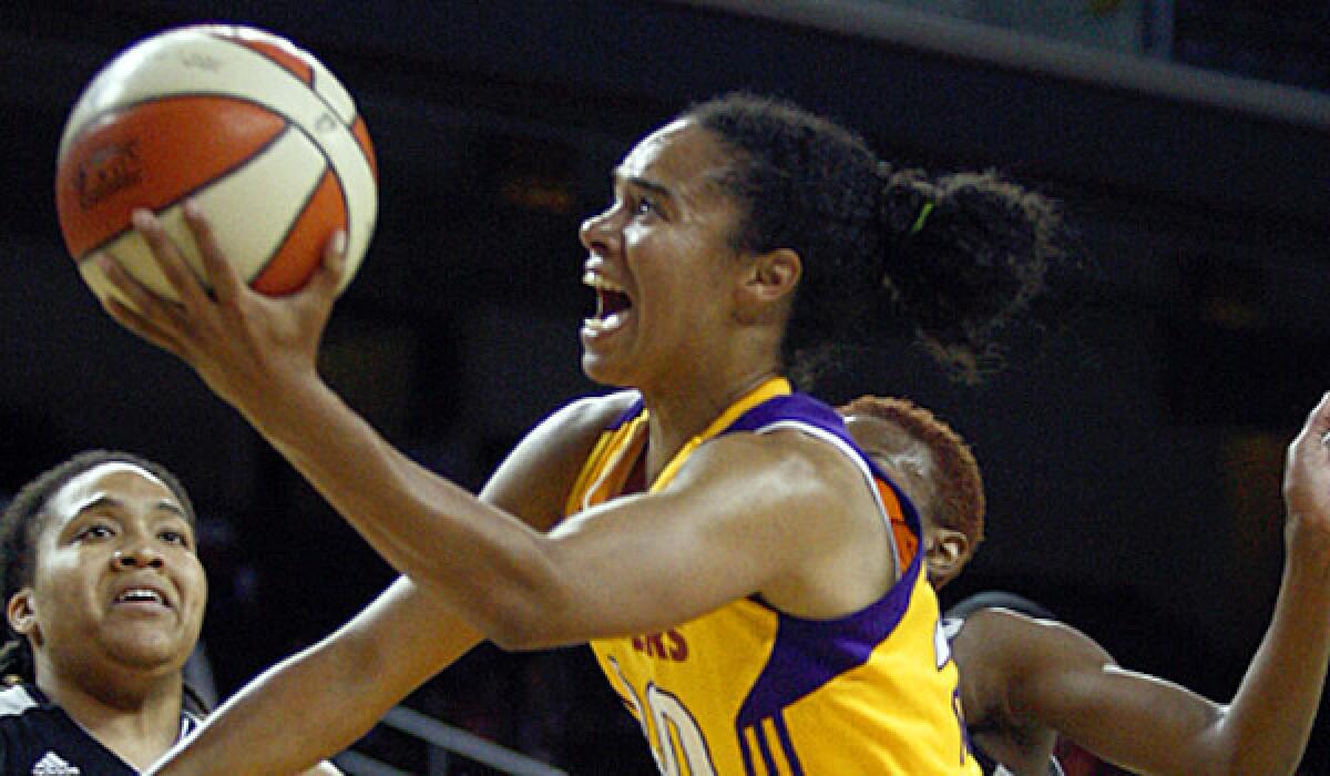 Kristi Toliver, shown back in September, scored 21 points in the Sparks' 76-69 overtime victory over Tulsa on Saturday night.