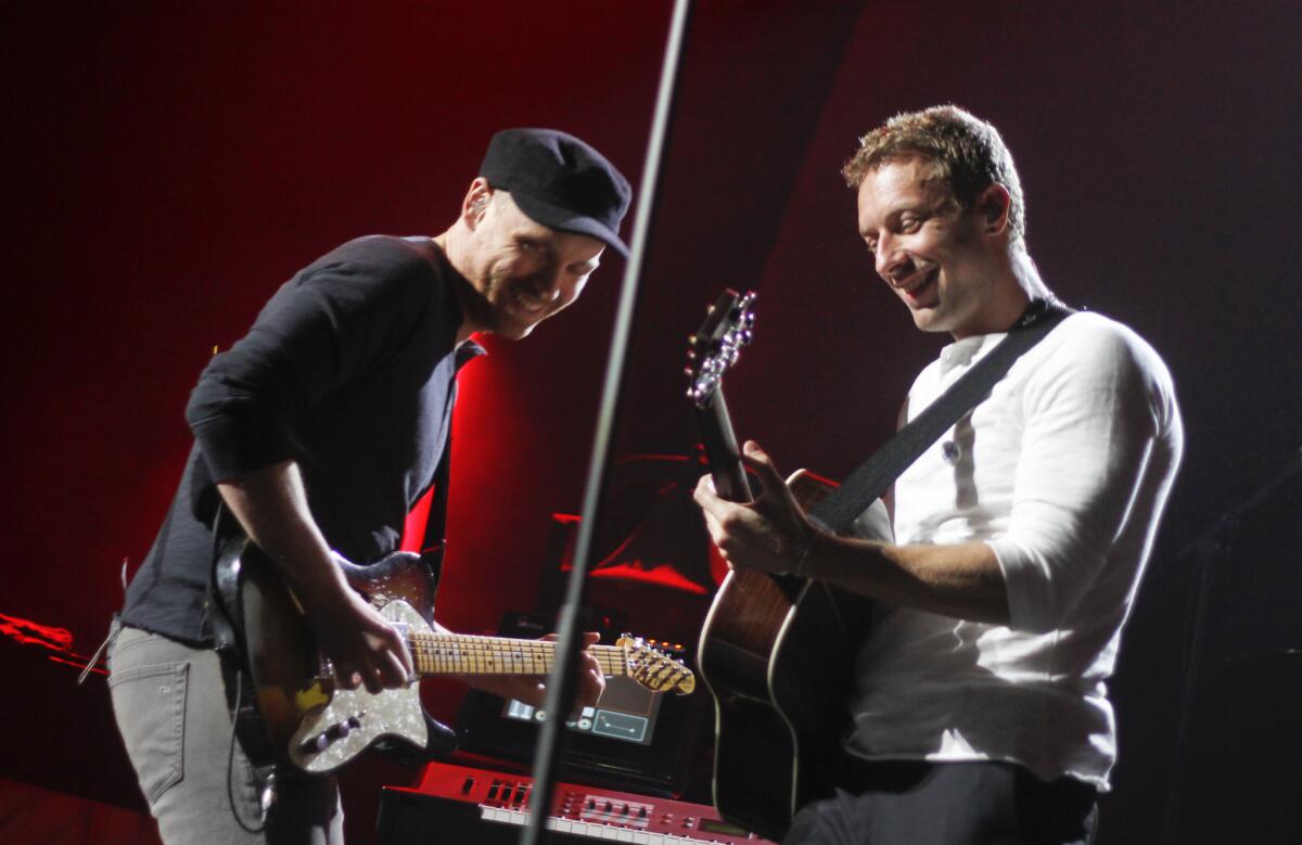 Coldplay's Jonny Buckland, left, and Chris Martin, shown performing in March in Austin, and the rest of the group will play May 19 at UCLA's Royce Hall in conjunction with the worldwide release that day of the band's new album "Ghost Stories."