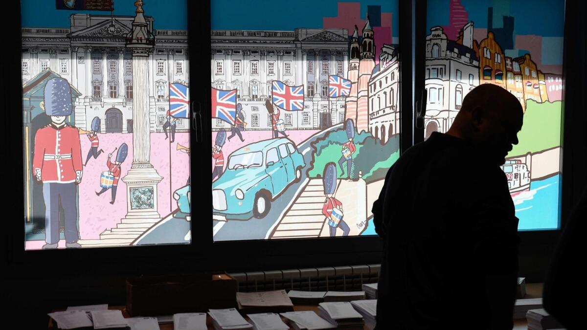 A man votes at a polling station in Madrid during general elections in Spain on Sunday.