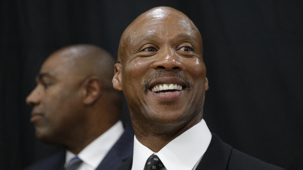 Lakers Coach Byron Scott smiles during the team's media day in El Segundo on Sept. 29.