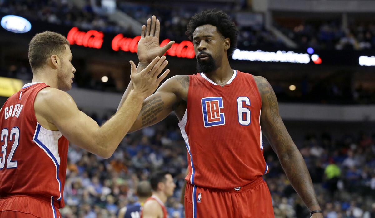 Los Angeles Clippers center DeAndre Jordan (6) and Blake Griffin (32) react to a play during the first half against the Dallas Mavericks on Wednesday.