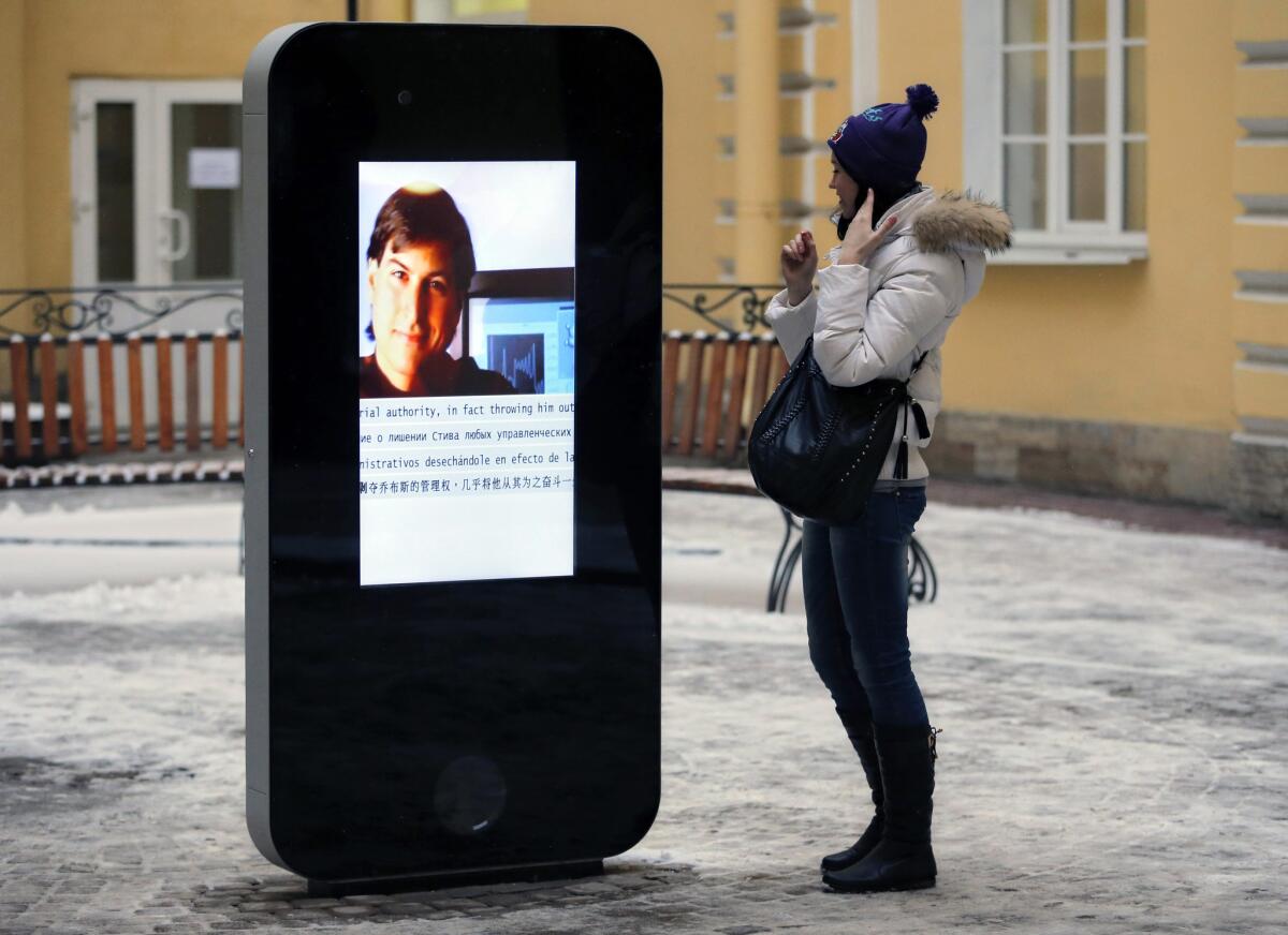 The iPhone-shaped memorial to Steve Jobs in St. Petersburg, Russia, has been taken down in response to last week's announcement that Apple CEO Tim Cook is gay.