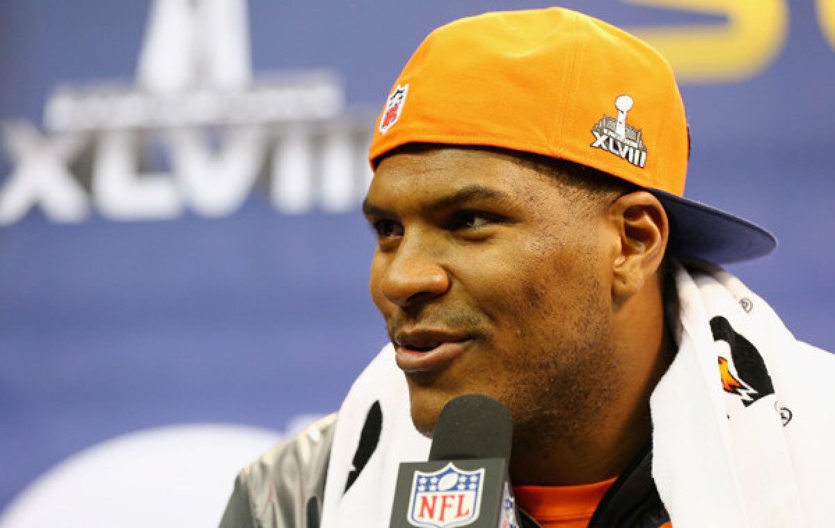 Denver Broncos tight end Julius Thomas answers questions at Super Bowl XLVIII media day at the Prudential Center in Newark, N.J., on Tuesday. Thomas has played an important role in the Broncos' offense this season.