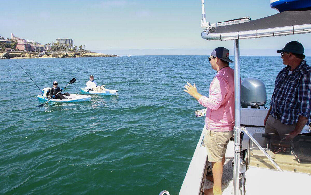 People sail in the Matlahuayl State Marine Reserve, a Marine Protected Area off La Jolla Cove, in 2019.