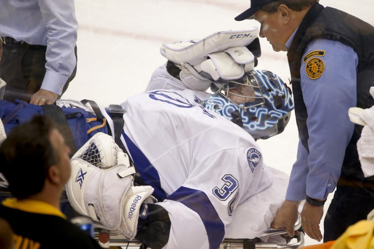 Lightning goalie Ben Bishop was carted off the ice after being injured during the first period of Game 1 of the Eastern Conference finals against the Penguins on May 13.