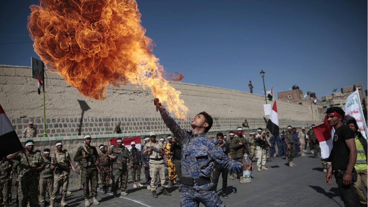 A newly recruited Shiite fighter, known as Houthi, displays his skills during a 2017 parade aimed at mobilizing more fighters into battlefronts to fight pro-government forces in several Yemeni cities, in Sanaa, Yemen.