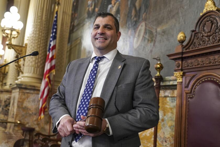 Pennsylvania Speaker of the House Mark Rozzi is photographed at the speaker's podium, Jan. 3, 2023, at the state Capitol in Harrisburg, Pa. When lawmakers convened to take oaths of office and pick a speaker, a deadlock was broken only when all seven members of GOP leadership and nine other Republicans joined all Democrats to elect Rep. Mark Rozzi, of the Reading area, as House speaker. Rozzi promised to act as an independent, saying he would caucus with neither party. (AP Photo/Matt Smith, file)