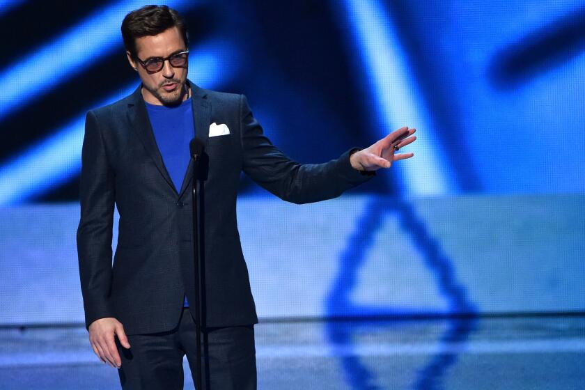 Robert Downey Jr. accepts the favorite movie actor award at the 2015 People's Choice Awards.