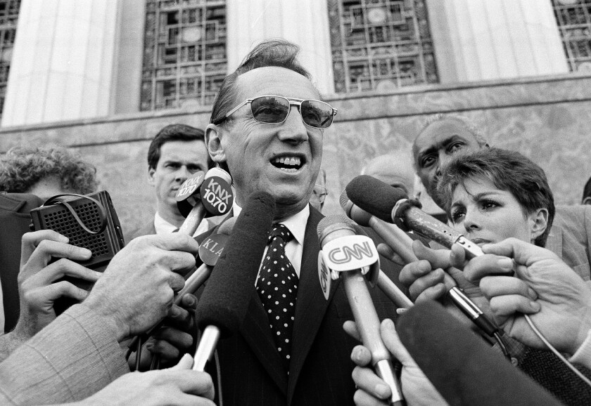 FILE - Los Angeles Raiders' owner Al Davis speaks to the media after a Federal Court jury ruled in favor of the team and the Los Angeles Coliseum in an antitrust suit against the National Football League, in Los Angeles, in this Wednesday, April 14, 1983, file photo. When director Ken Rodgers decided to do a documentary looking back on the battles between late Raiders owner Al Davis and late NFL commissioner Pete Rozelle he decided he wanted to tell the stories from their perspectives. (AP Photo/Nick Ut, File)