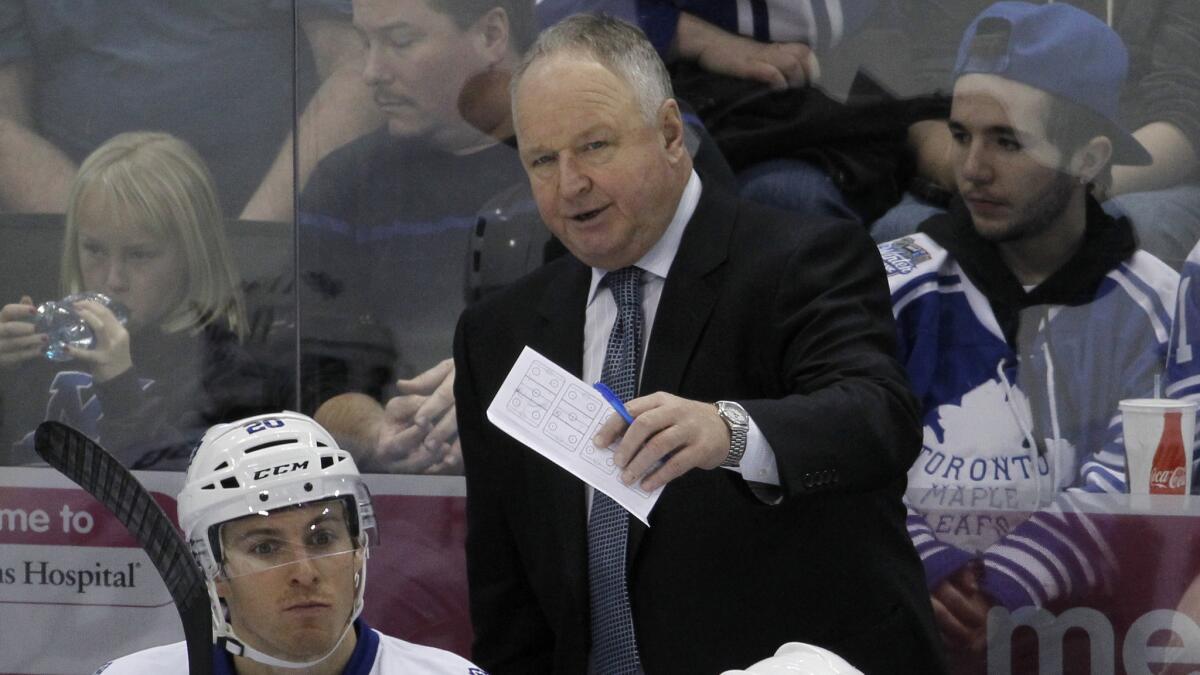 Toronto Maple Leafs Coach Randy Carlyle on the bench during a loss to the Minnesota Wild on Friday.