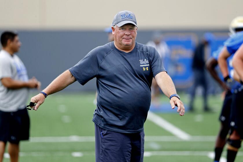 LOS ANGELES, CALIF. -- WEDNESDAY, JULY 31, 2019: Chip Kelly, head coach, at fall football camp practice at the football fields at the Wasserman Football Center on the campus of UCLA in Los Angeles, Calif., on July 31, 2019. (Gary Coronado / Los Angeles Times)