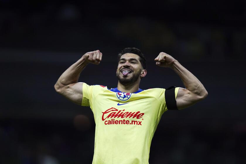 America's Henry Martin celebrates scoring his side's second goal against Leon during a Mexican soccer league match at Azteca Stadium in Mexico City, Saturday, Dec. 2, 2023. (AP Photo/Marco Ugarte)