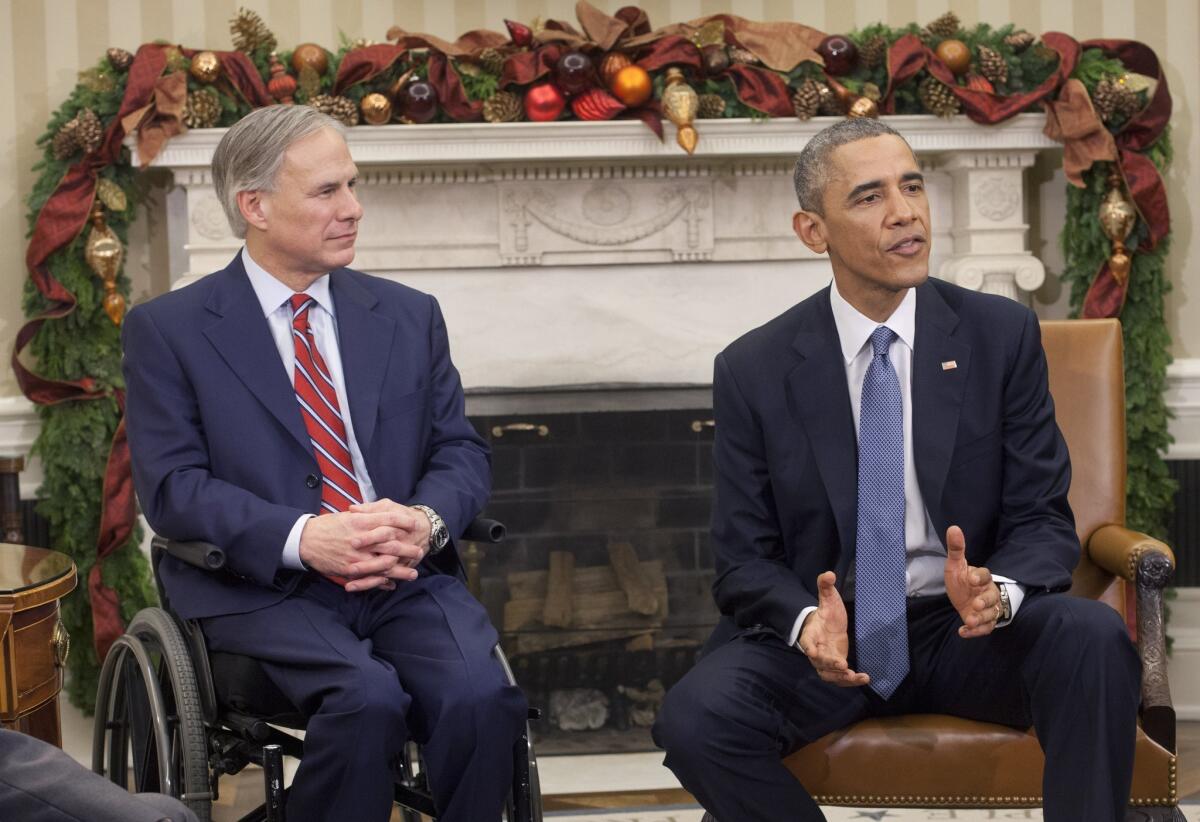 Will Texas be the next domino to fall on Medicaid? Above, the state's Republican governor-elect, Greg Abbott, meets with President Obama in early December.