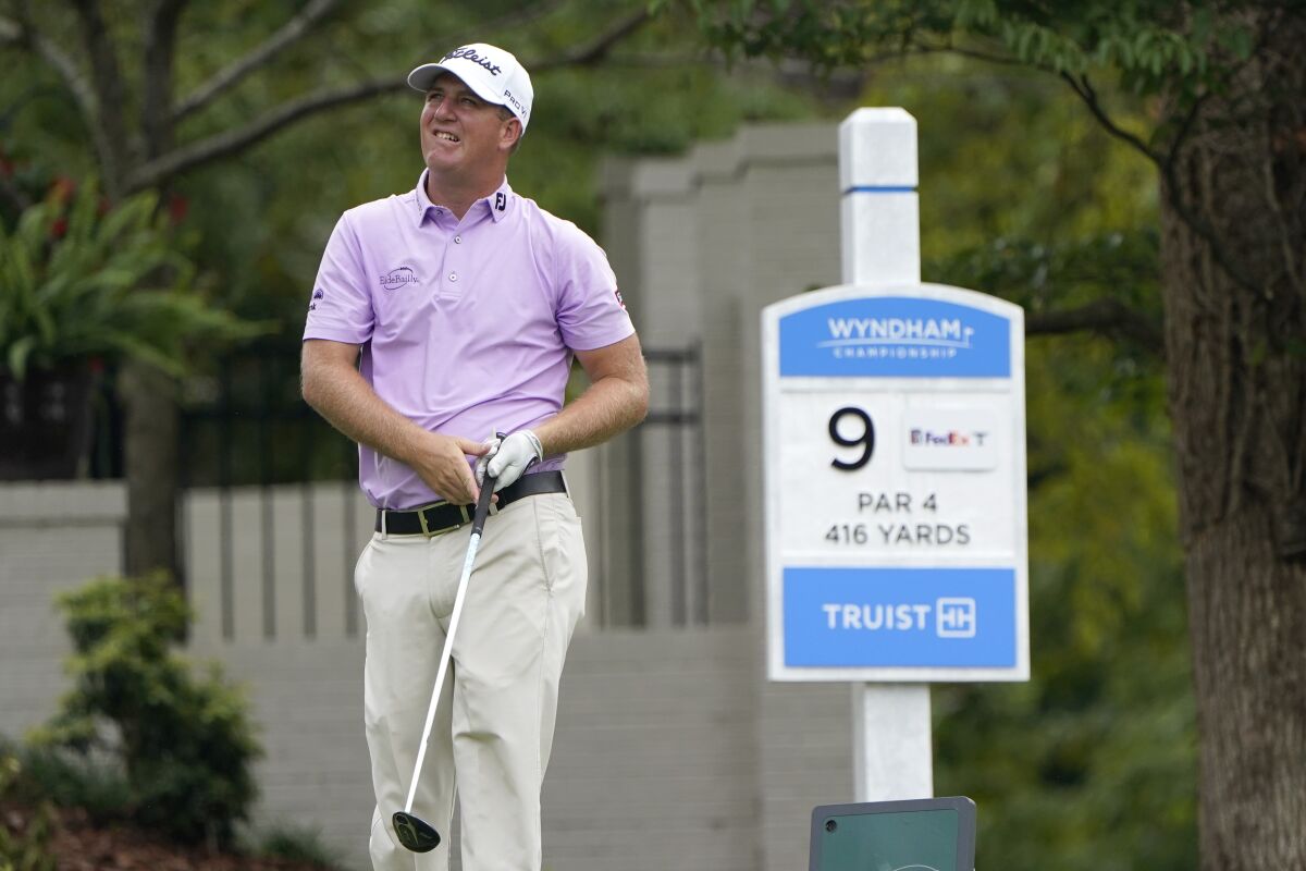 Tom Hoge watches his drive on the ninth hole during the second round of the Wyndham Championship golf tournament at Sedgefield Country Club on Friday, Aug. 14, 2020, in Greensboro, N.C. (AP Photo/Chris Carlson)
