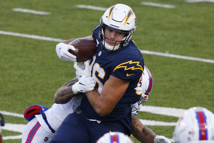 Chargers tight end Hunter Henry is tackled after making a catch