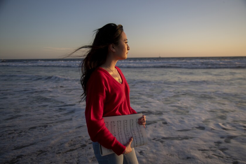 Pianist Sharon Su with some of her favorite sheet music