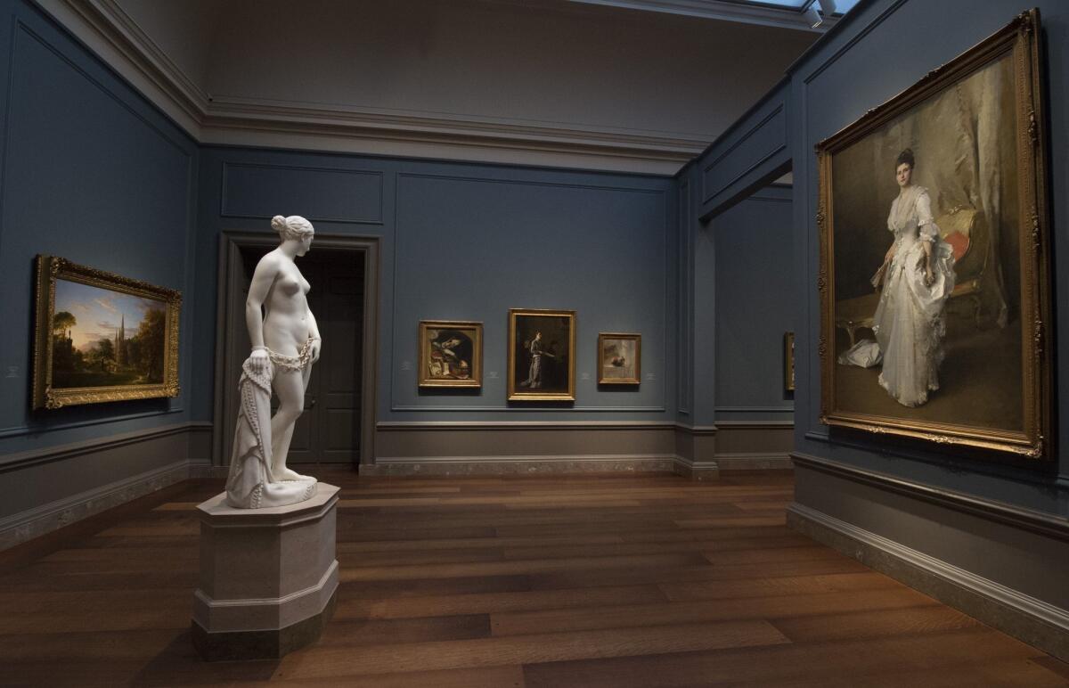 Hiram Powers' marble sculpture "The Greek Slave" is displayed at the National Gallery of Art with thousands of other prized works acquired from the now-shuttered Corcoran Gallery.