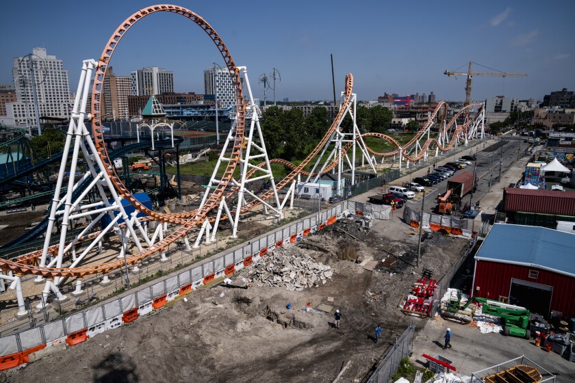 Construction is underway in the amusement park district of Coney Island, Friday, June 17, 2022, in the Brooklyn borough of New York. Luna Park in Coney Island will open three new major attractions this season alongside new recreational areas and pedestrian plazas. (AP Photo/John Minchillo)