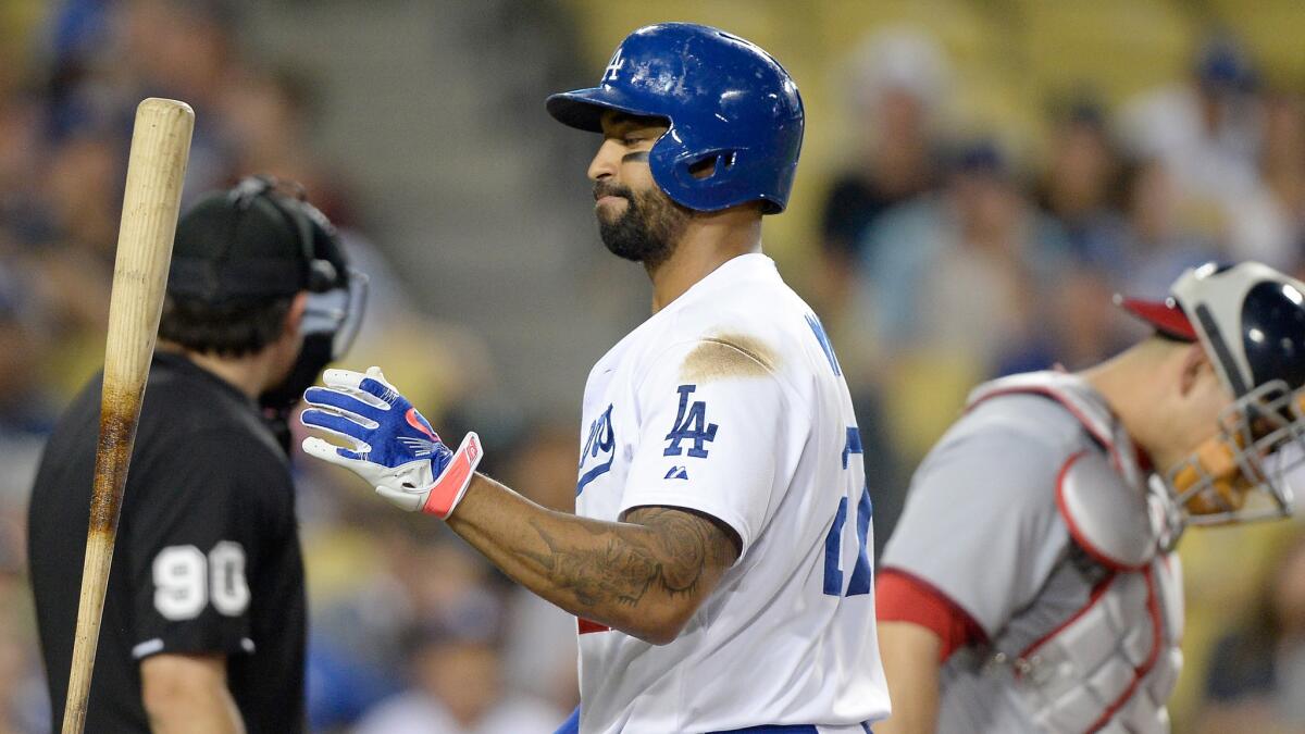 Dodgers outfielder Matt Kemp reacts after striking out in the ninth inning of the team's 6-4 loss to the Washington Nationals on Monday.