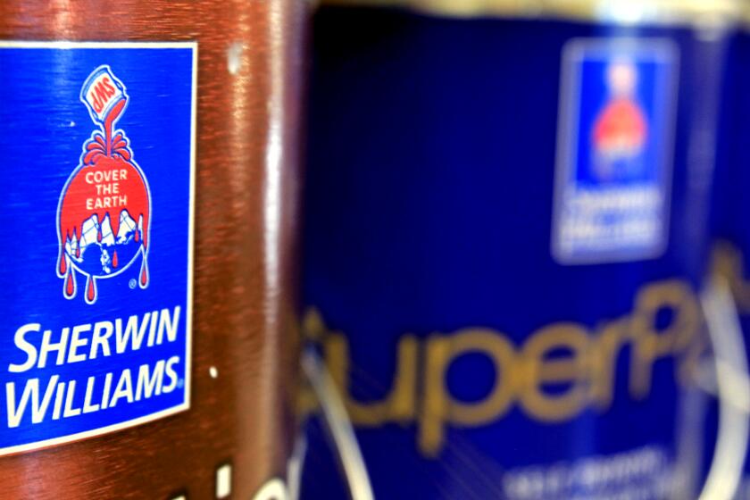 In this Oct. 20, 2010, file photo, cans of paint are seen at a Sherwin Williams store in Brunswick, Maine. Sherwin-Williams is one of a number of companies that have warned higher costs are hurting profits. (AP Photo/Pat Wellenbach, File)