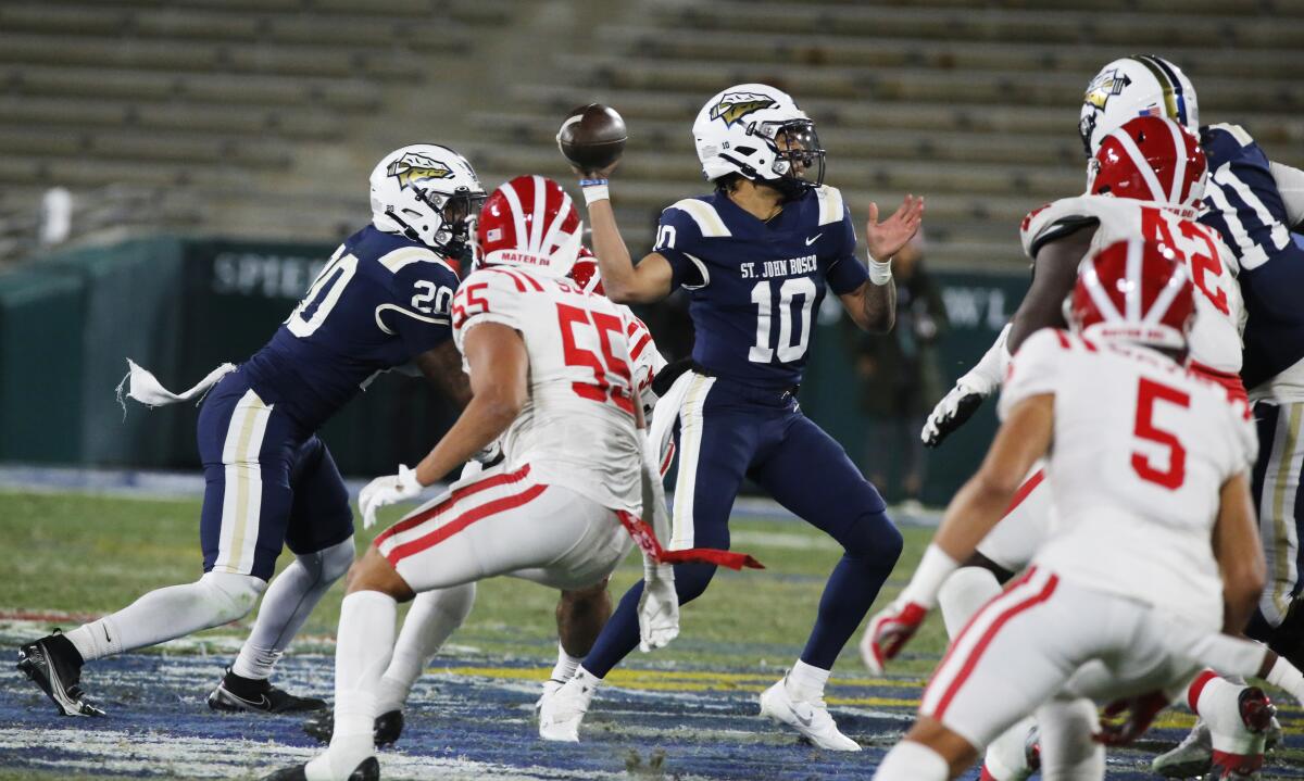 St John Bosco quarterback Pierce Clarkson throws downfield against Mater Dei.