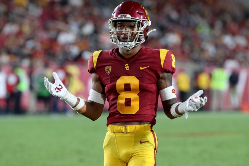 LOS ANGELES, CALIF. - SEP 11, 2021. USC cornerback Chris Steele racts after being flagged for pass interference against Stanford in the third quarter at the Coliseum on Saturday night, Sep. 11, 2021. (Luis Sinco / Los Angeles Times)
