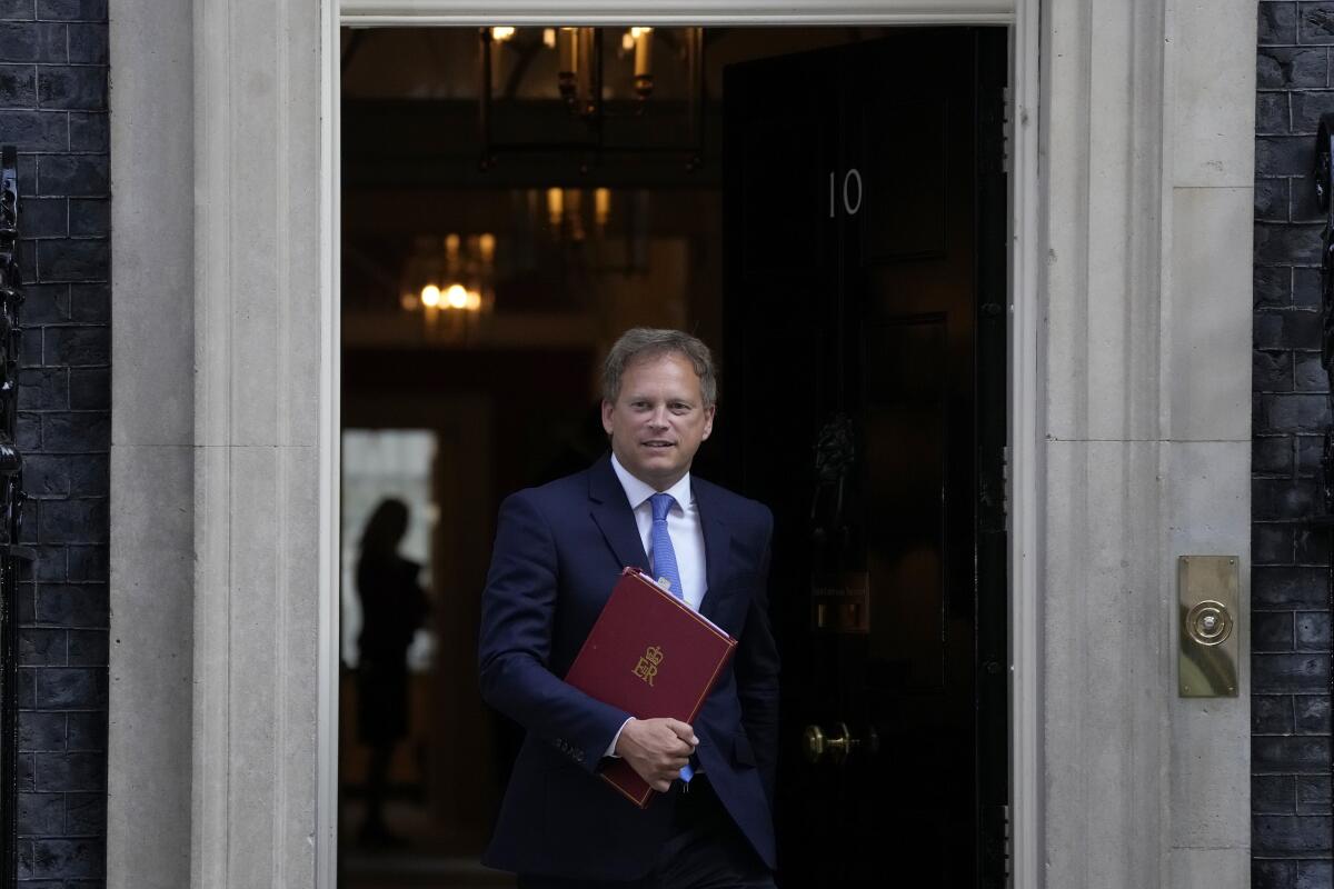 Britain's Transport Secretary Grant Shapps leaves a cabinet meeting at 10 Downing Street, in London, Tuesday, Sept. 7, 2021. (AP Photo/Matt Dunham)