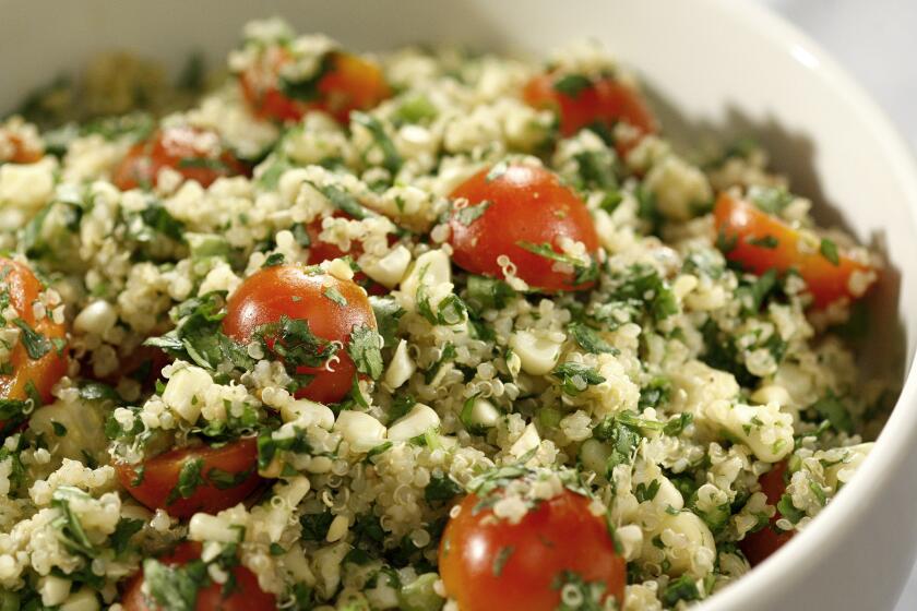 Quinoa salad with grilled corn, tomatoes and cilantro. Read the recipe