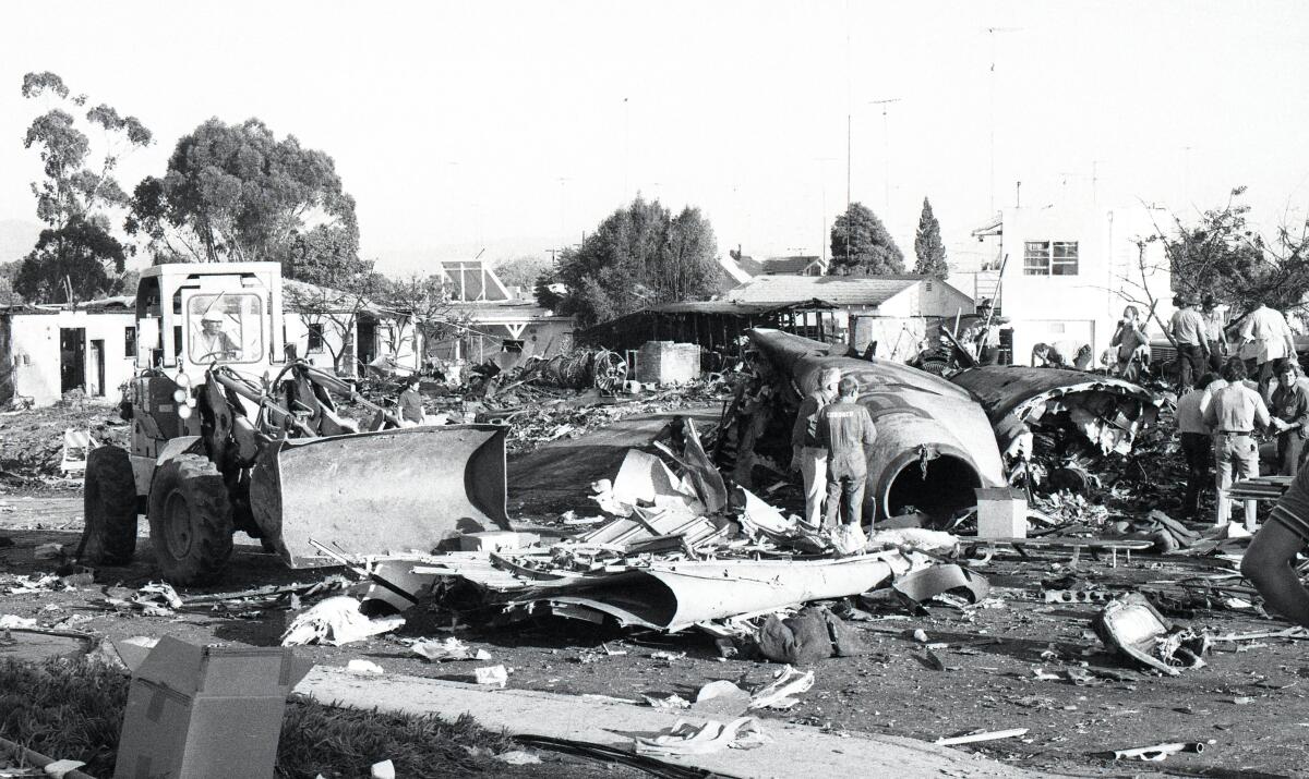 Rubble from homes and wreckage from PSA Flight 182 are strewn on Dwight Street in San Diego on Sept. 25, 1978.