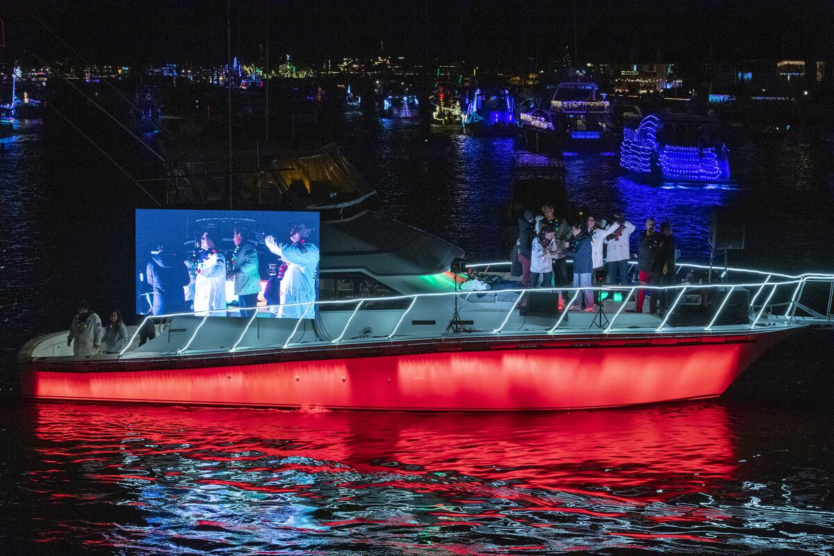 A boat carrying the U.S. Olympians from Orange County.
