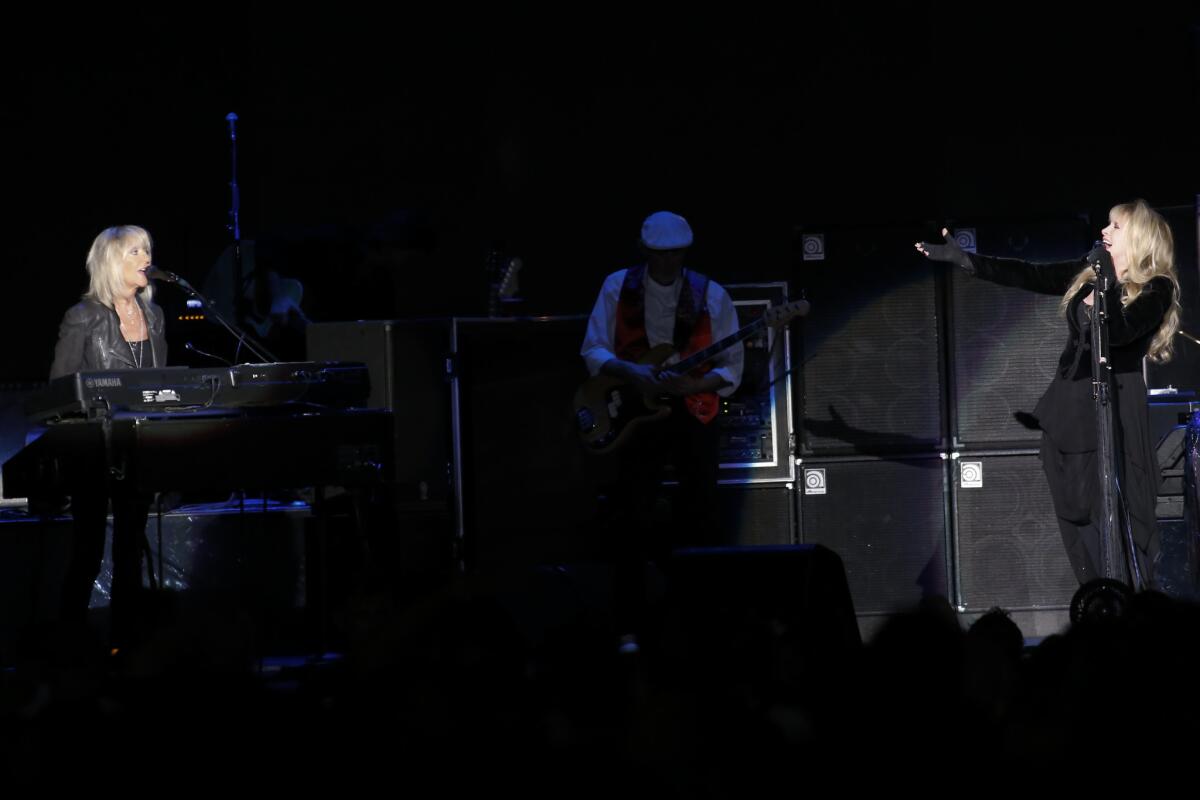 Christine McVie, left, and Stevie Nicks perform during Fleetwood Mac's concert Saturday night at the Forum in Inglewood.