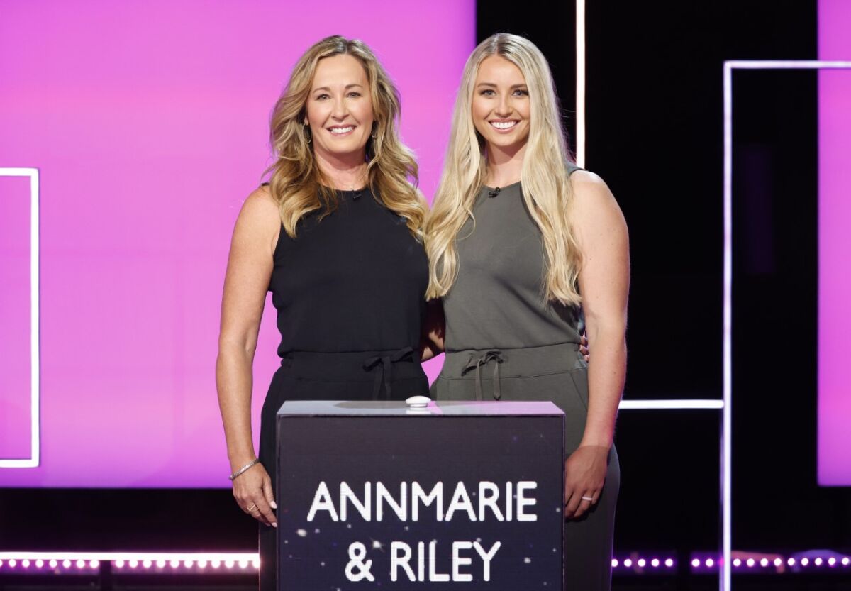 Annmarie Tejcek, l, and her daughter, Riley Compton, won $90,500 on the word puzzle show, "Lingo," in the March 8 episode.