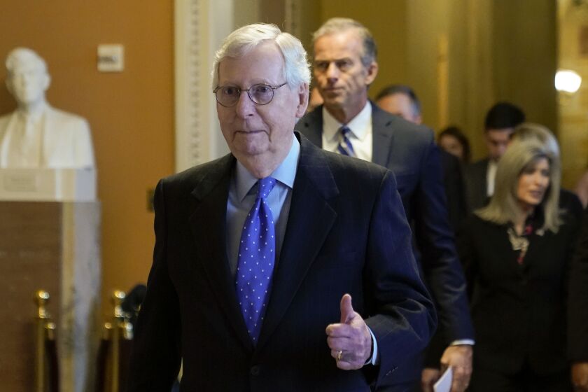 Senate Minority Leader Mitch McConnell of Ky., gestures after being reelected as Republican leader, quashing a challenge from Sen. Rick Scott, R-Fla., in the Senate Republican leadership elections on Capitol Hill in Washington, Wednesday, Nov. 16, 2022. (AP Photo/Patrick Semansky)