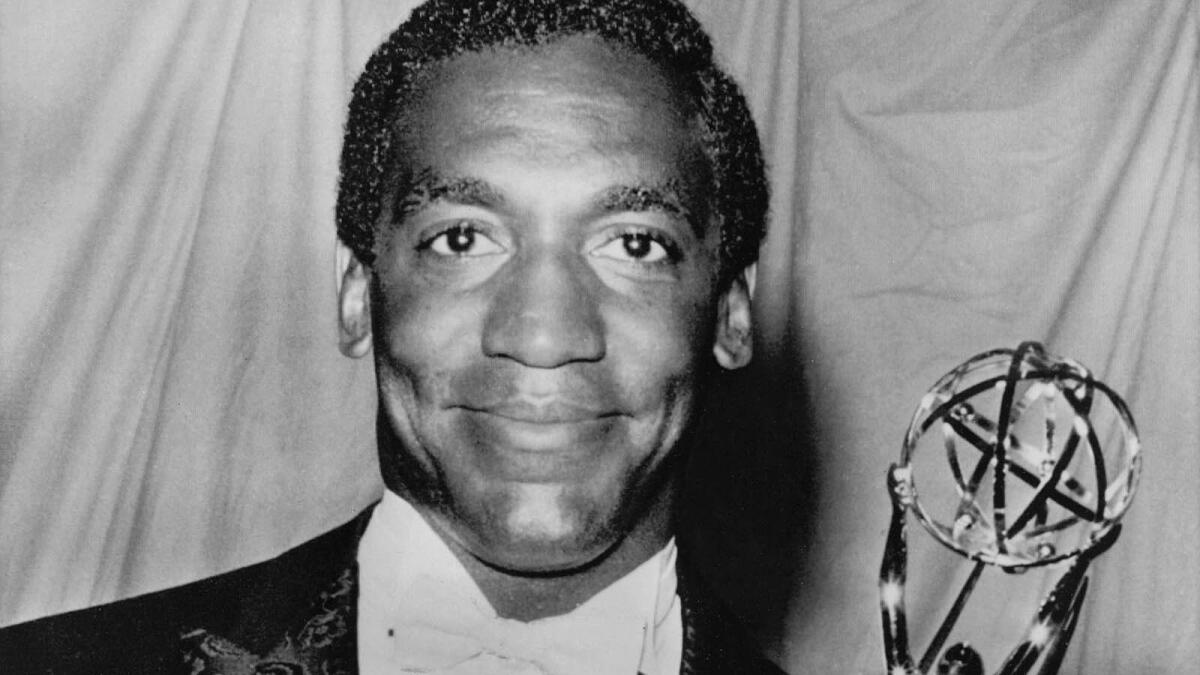 Bill Cosby received three consecutive Emmy Awards for lead actor in a drama series for "I Spy." The comedian was the first African American to win the award. (Associated Press)