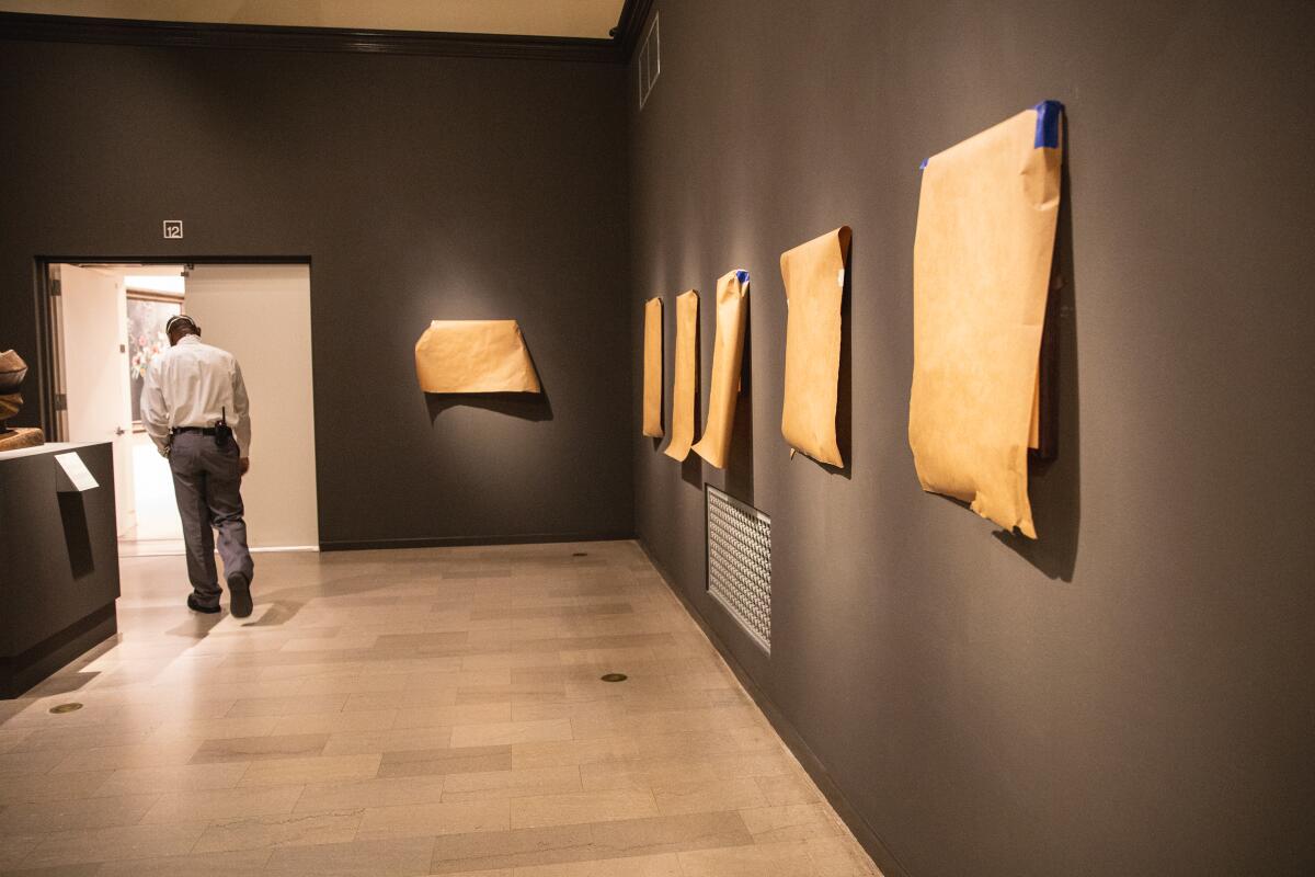 Covered art work at The San Diego Museum of Art on Wednesday, March 17.