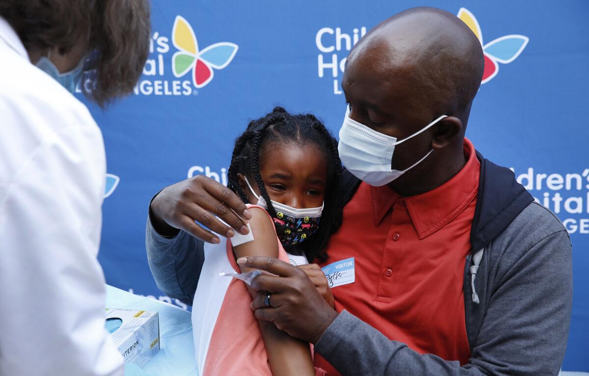 Alahna Alleyne, 5, and her father, Samuel