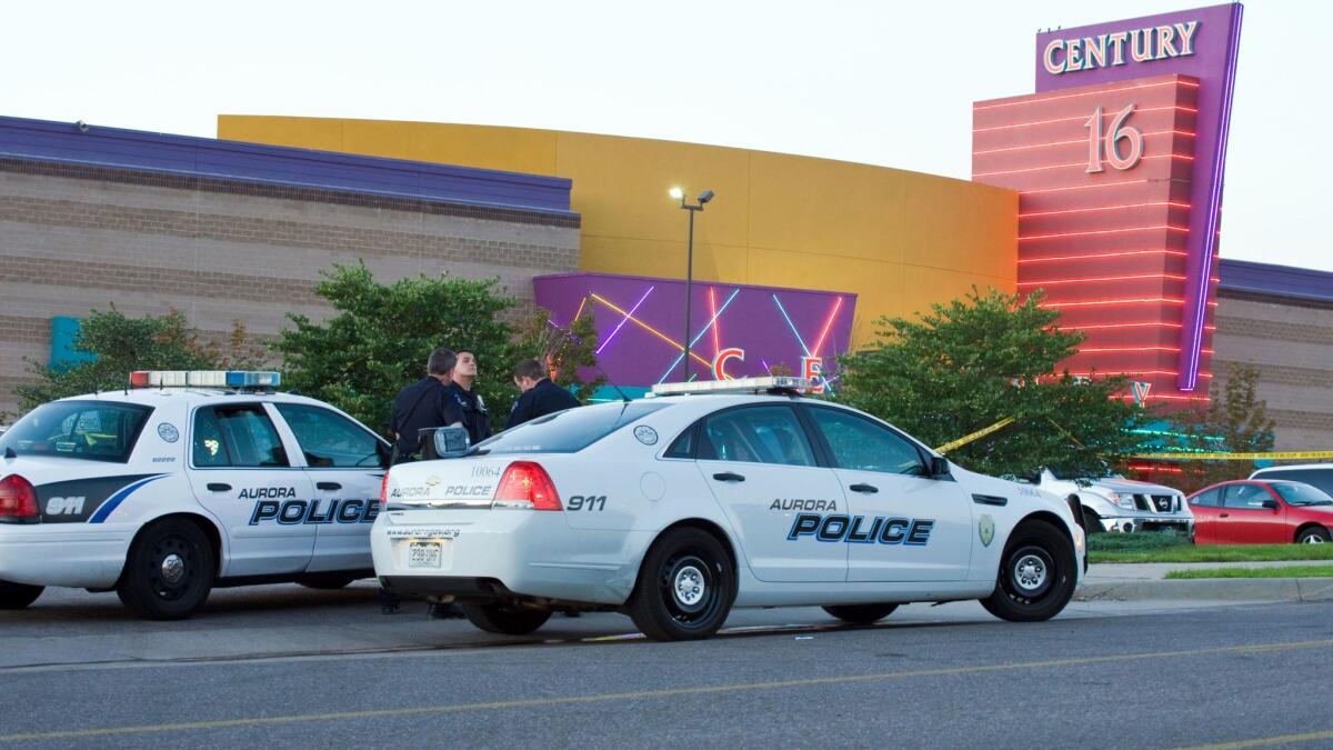 Police at the theater in Aurora, Colo., where a gunman opened fire on July 20, 2012.