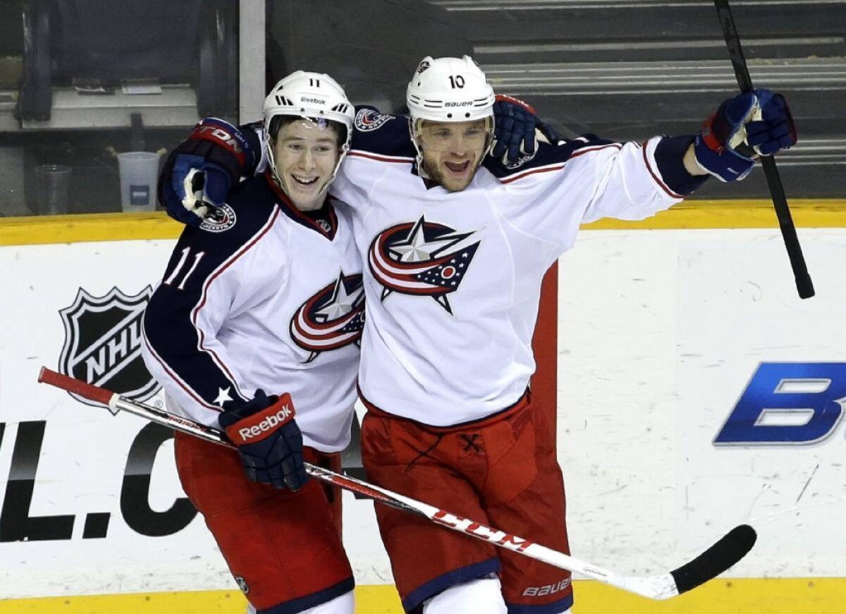 Marian Gaborik, right, is headed from Columbus to the Kings.