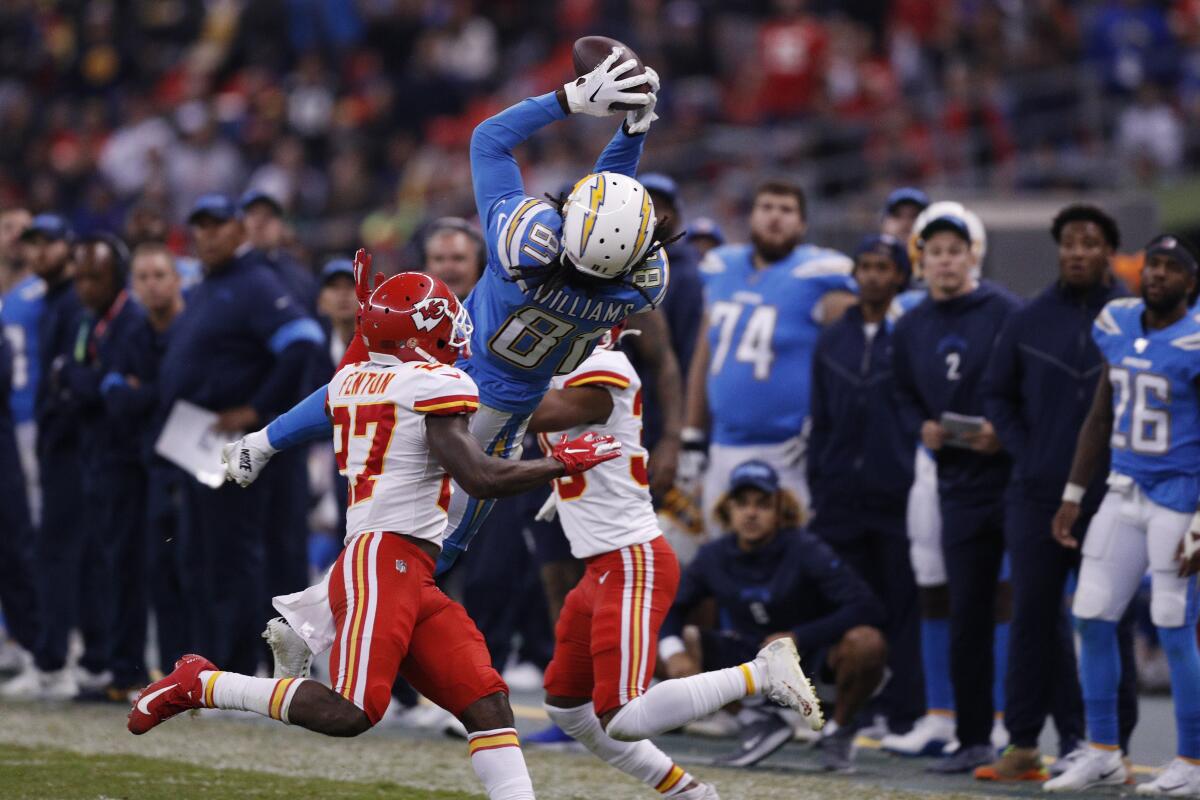 Chargers receiver Mike Williams catches a 50-yard pass from quarterback Philip Rivers late in the fourth quarter of a game against the Chiefs in Mexico City.