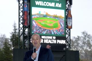 John Fisher, owner of the Oakland Athletics baseball team, announces that his team will leave Oakland after this season and play temporarily at a minor league park, during a news conference in West Sacramento, Calif., Thursday, April 4, 2024. The A's announced the decision to play at the home of the Sacramento River Cats from 2025-27 with an option for 2028 on Thursday after being unable to reach an agreement to extend their lease in Oakland during that time. (AP Photo/Rich Pedroncelli)