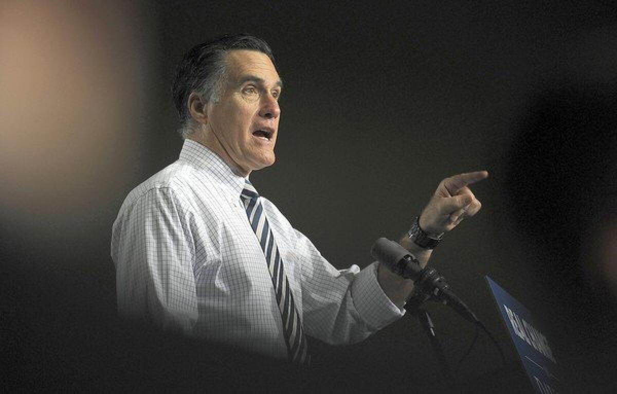 Republican presidential candidate Mitt Romney addresses supporters in Des Moines.
