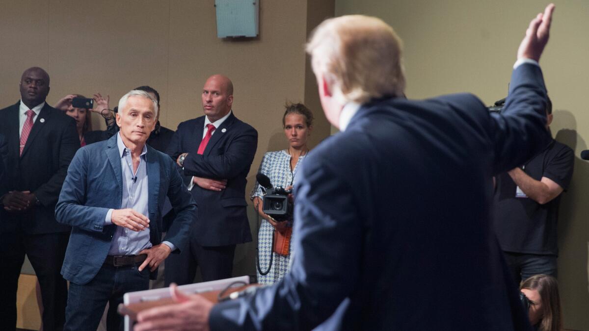 Jorge Ramos questions Donald Trump at a campaign event in Dubuque, Iowa, on Aug. 25.