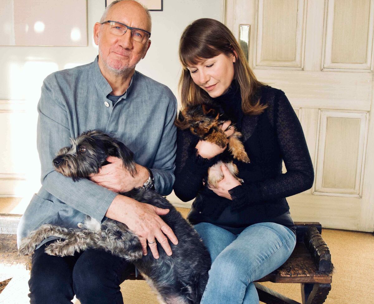 "Animal Requiem" composer Rachel Fuller, husband Pete Townshend and two of their dogs. 
